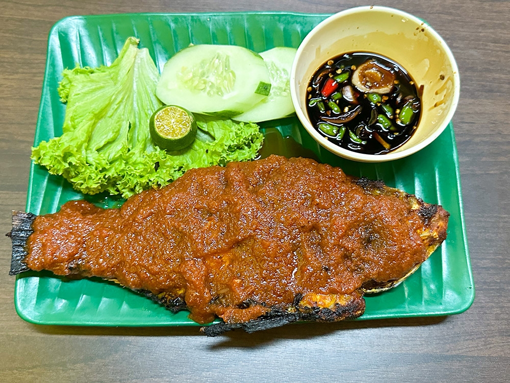 At night, they serve 'ikan bakar' like this one with tilapia fish.