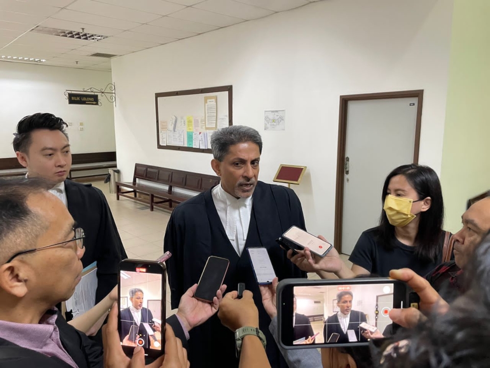 Toh Puan Datuk Patingi Raghad Kurdi Taib’s counsel Shankar Ram speaks to reporters when met at the end of the proceedings at the Kuching Court Complex, June 19, 2023. — Borneo Post pic 