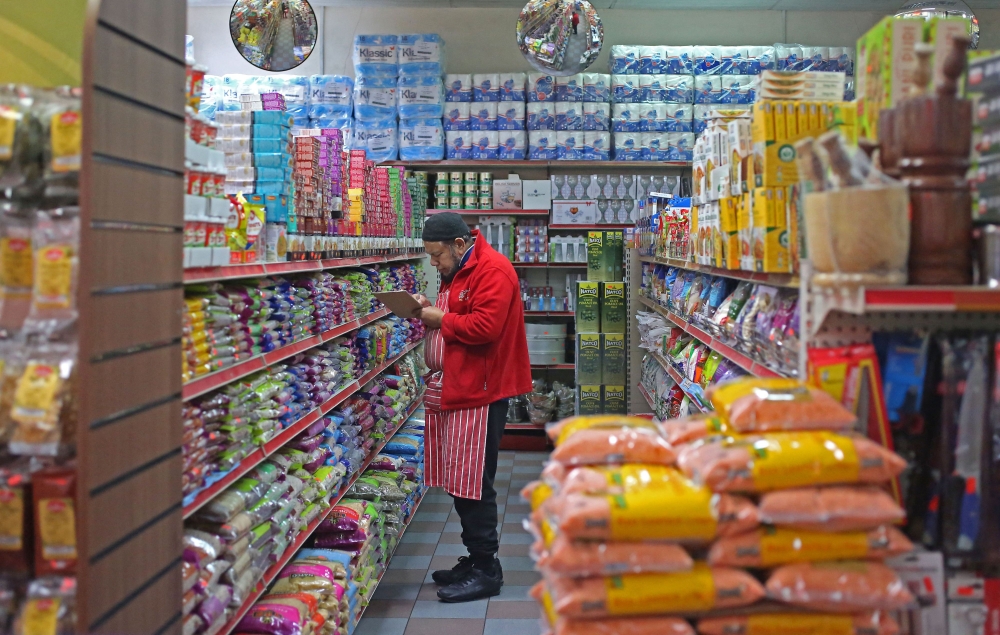 Theft from convenience stores in the UK reached record levels last year, according to a trade body, blaming criminal gangs and a cost-of-living crisis. — AFP pic