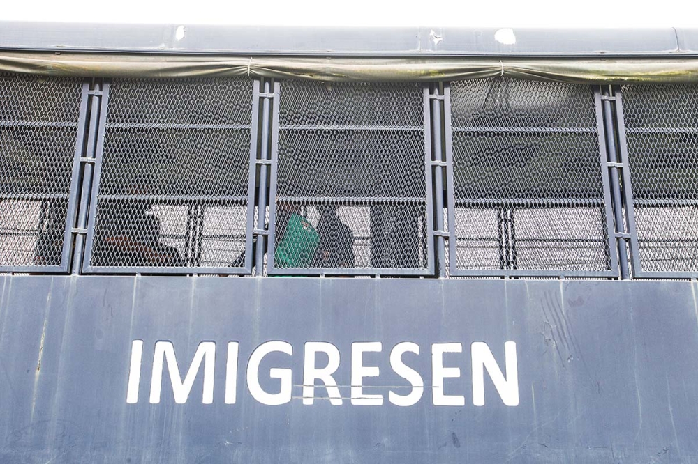 Detainees are seen outside the Sri Impian Immigration depot in Bandar Baharu, Kedah, in this April 20, 2022 file photograph. — Picture By Sayuti Zainudin