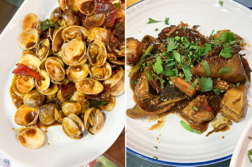 With the Gong Poh Lala, you get clams fried in a brown savoury sauce (left). Their Asam Stingray is different as the sauce isn't tangy but more savoury with pieces of 'asam keping' (right)