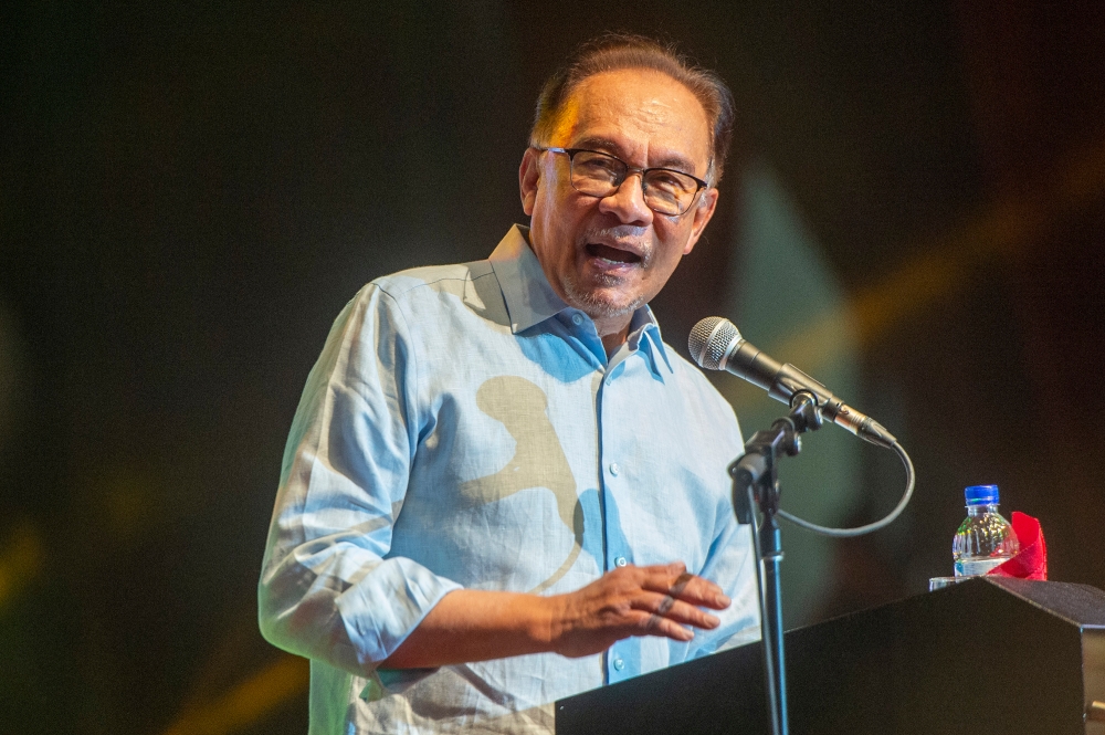 Prime Minister Datuk Seri Anwar Ibrahim delivers a speech during the launch of Rakan Muda Nafas Baharu at Dewan Canselor Tun Abd Razak, Universiti Kebangsaan Malaysia June 25, 2023. — Picture by Shafwan Zaidon