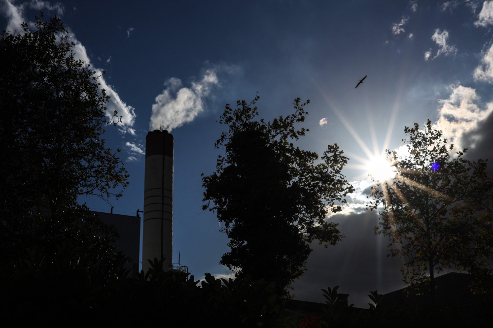 Global energy sector carbon dioxide emissions hit a record peak last year counter to Paris commitments, a key study warned today. — AFP pic