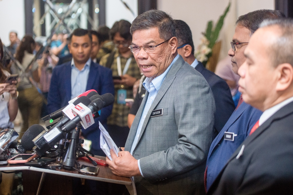 Home Minister Datuk Seri Saifuddin Nasution Ismail speaks to the media after the joint committee meeting between the Home Ministry and Human Resources Ministry in Putrajaya, June 27, 2023. — Picture by Shafwan Zaidon