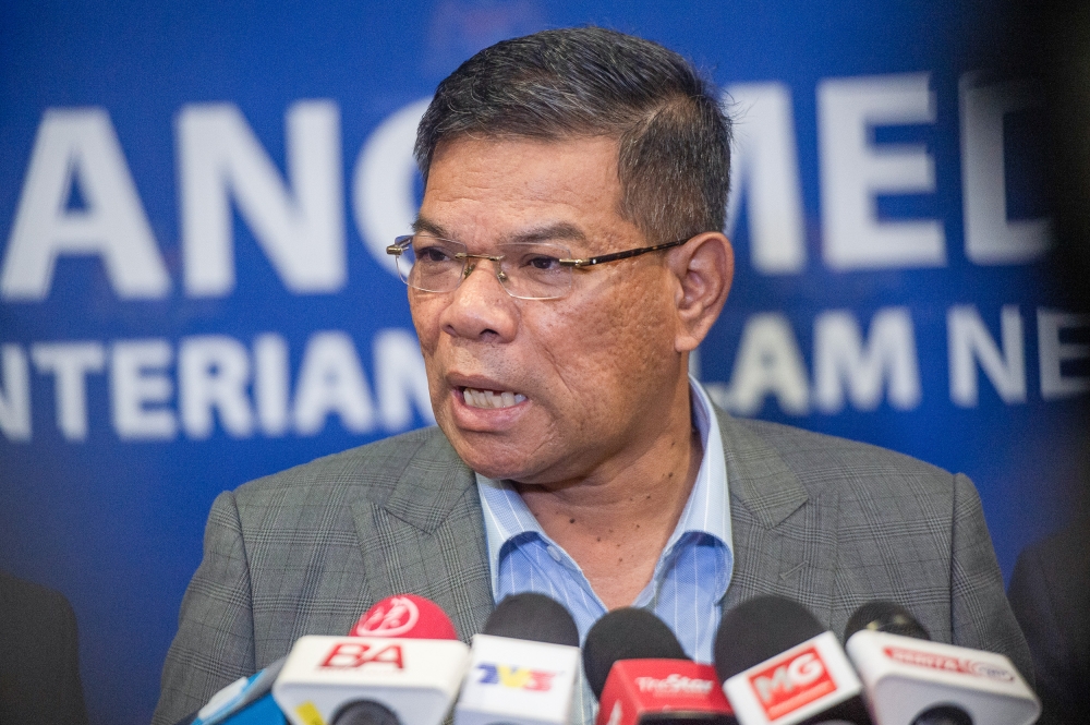 Home Minister Datuk Seri Saifuddin Nasution Ismail said that the government will act against the agents and employers involved, which would include ‘blacklisting’ the companies. — Picture by Shafwan Zaidon