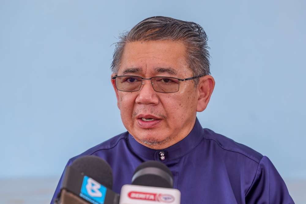 Domestic Trade and Cost of Living Minister Datuk Seri Salahuddin Ayub speaks to reporters after handing over sacrificial meat to residents of the Pulai parliamentary constituency in Bandar Baru Uda, June 29, 2023. — Bernama pic 