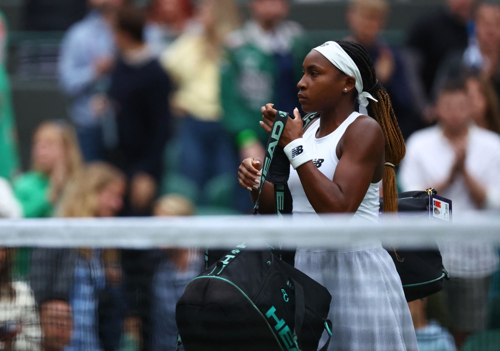 Coco Gauff of the US looks dejected after her first round match against Sofia Kenin of the US at the All England Lawn Tennis and Croquet Club, London July 3, 2023.¬ — Reuters pic