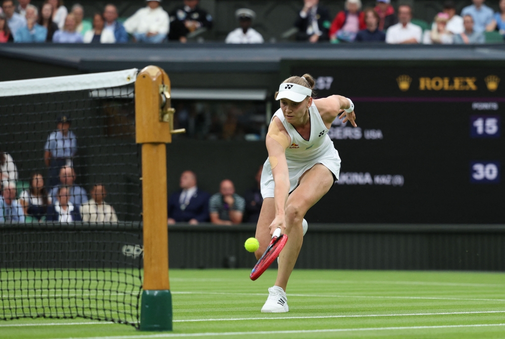 Kazakhstan’s Elena Rybakina returns the ball to US player Shelby Rogers during their women’s singles tennis match on the second day of the 2023 Wimbledon Championships at The All England Tennis Club in Wimbledon, southwest London, on July 4, 2023. — AFP pic 