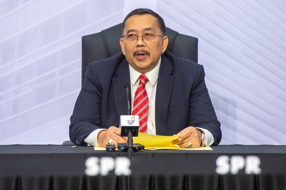 Election Commission chairman Tan Sri Abdul Ghani Salleh speaks during a press conference in Putrajaya July 5, 2023. ― Picture by Shafwan Zaidon