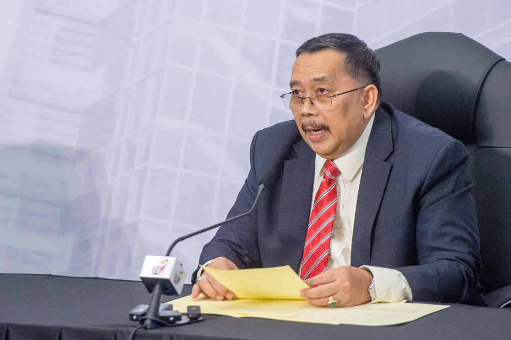 Election Commission chairman Tan Sri Abdul Ghani Salleh speaks during a press conference in Putrajaya July 5, 2023. ― Picture by Shafwan Zaidon