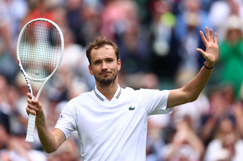 Russia’s Daniil Medvedev celebrates winning his first round match against Britain’s Arthur Fery at All England Lawn Tennis and Croquet Club, London, Britain, July 5, 2023. — Reuters pic 