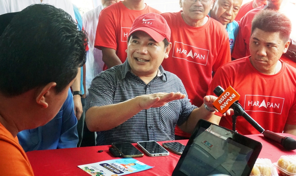 Economy Minister Rafizi Ramli (centre) speaks during a press conference after a Madani Tour programme at the Suka Menanti State Assembly area in Alor Setar July 8, 2023. — Bernama pic