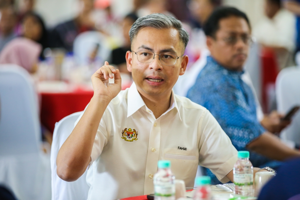 Communications and Digital Minister Fahmi Fadzil conveyed his condolences to the family of former AirAsia Bhd chairman and co-founder Datuk Pahamin A Rajab, who died of a heart attack in London last night. — Picture by Ahmad Zamzahuri