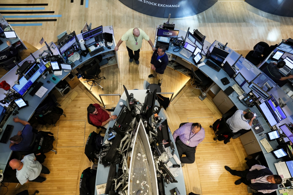 Traders work on the floor of the New York Stock Exchange (NYSE) in New York City July 7, 2023. — Reuters pic