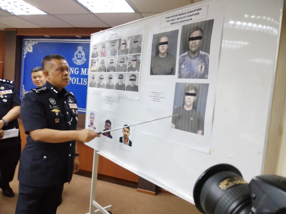 Johor police chief Datuk Kamarul Zaman Mamat at a media conference at the Johor police contingent headquarters in Johor Baru, July 14, 2023. — Picture by Ben Tan