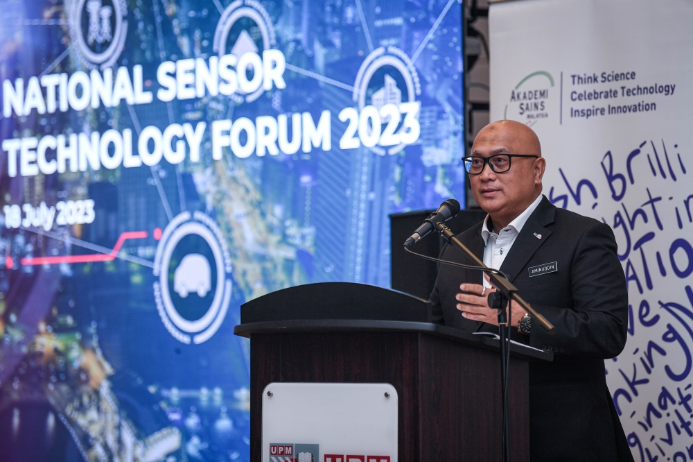 Science, Technology and Innovation Ministry secretary-general Datuk Aminuddin Hassim speaks while officiating the National Sensor Technology Forum 2023 at Universiti Putra Malaysia in Kuala Lumpur July 18, 2023. — Bernama pic