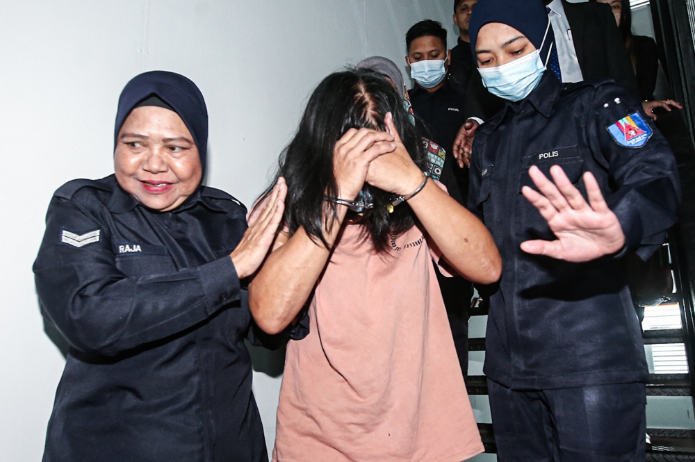 Tan Wooi Cheng was charged under Section 302 of the Penal Code with killing the infant at a house in Persiaran Klebang 5, Tawas Indah, Chemor between 12am of July 9 and 11am of July 12. — Picture by Farhan Najib