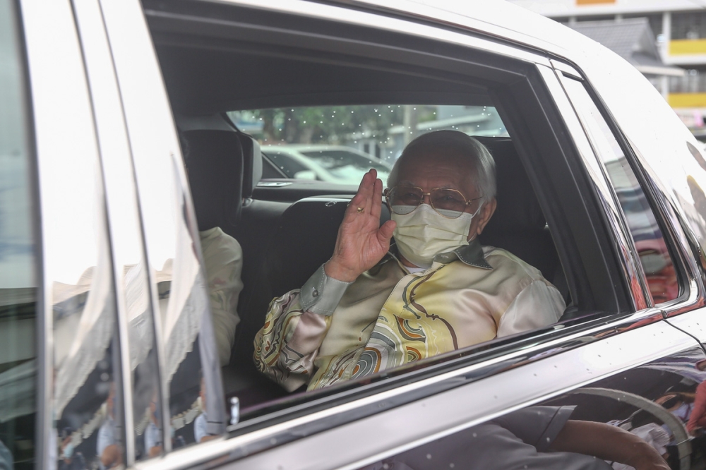 File picture of Sarawak Governor Tun Abdul Taib Mahmud leaving the polling centre at Kompleks Sukan Satok in Kuching December 18, 2021. Taib confirmed today that he is in good health and is now overseas. — Picture by Yusof Mat Isa