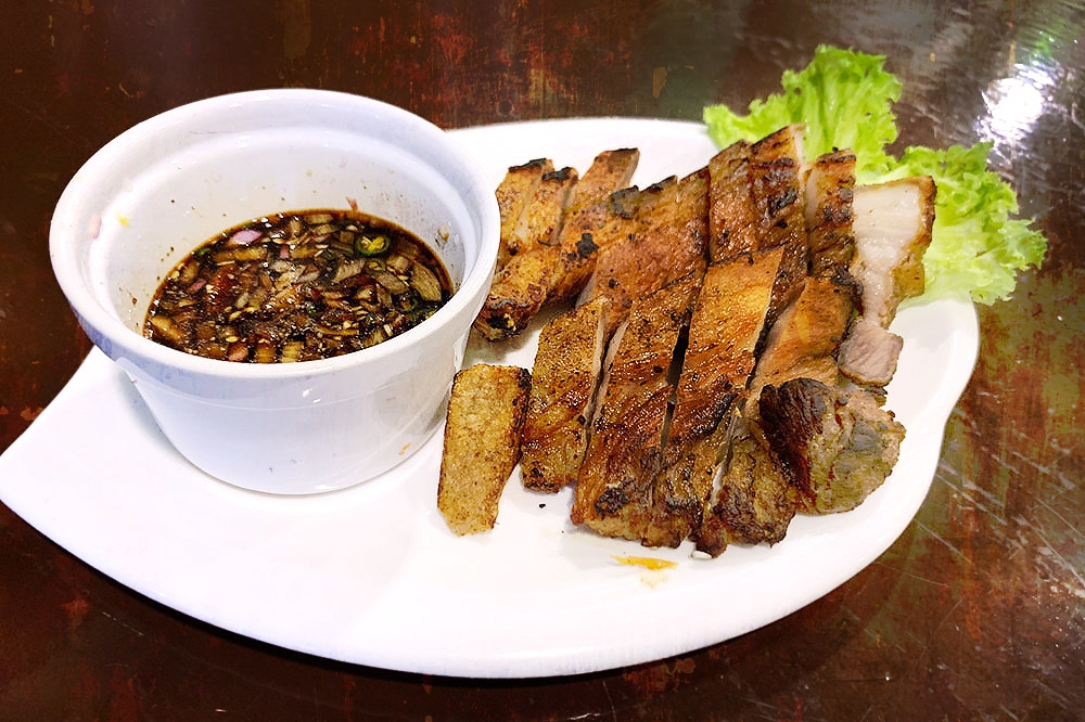 'Inihaw na liempo' is grilled pork belly that uses calamansi juice for tangy citrusy flavour.