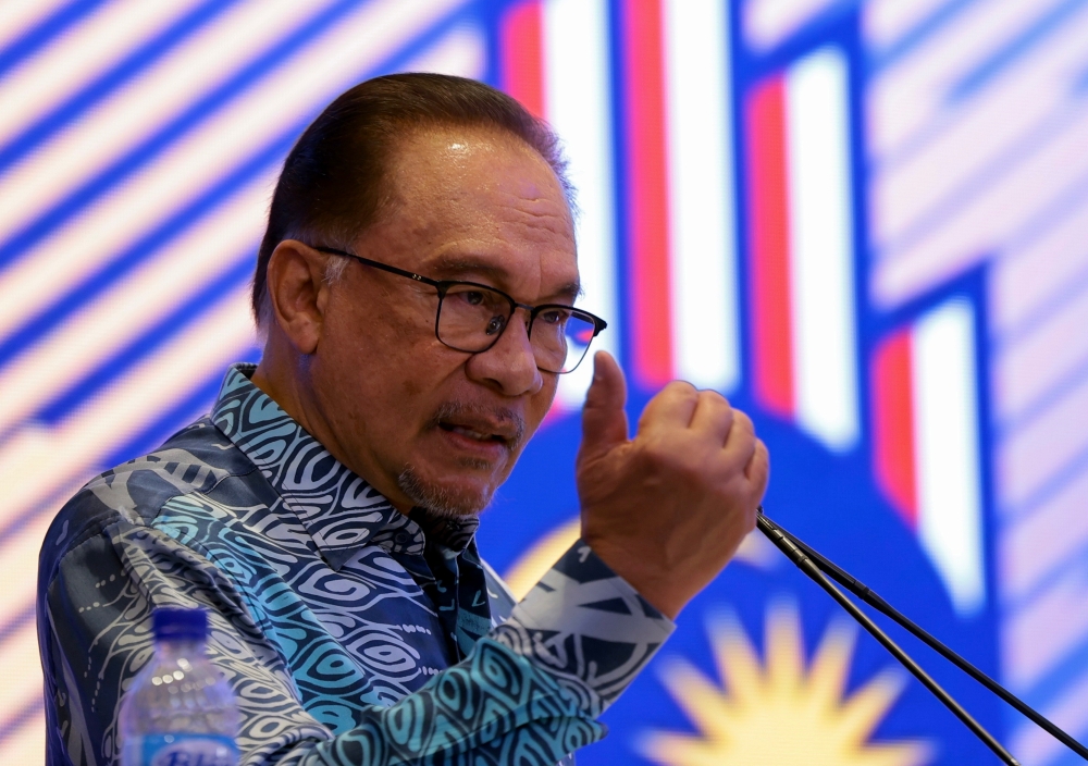 Prime Minister Datuk Seri Anwar Ibrahim speaks during the launch of the 'Ekonomi Madani: Memperkasa Rakyat '(Madani Economy: Empowering the People) framework in Kuala Lumpur July 27, 2023. ― Bernama pic