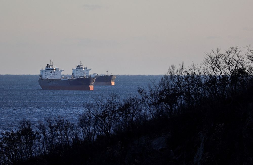 Crude oil tankers lie at anchor in Nakhodka Bay near the port city of Nakhodka, Russia, December 4, 2022. — Reuters pic