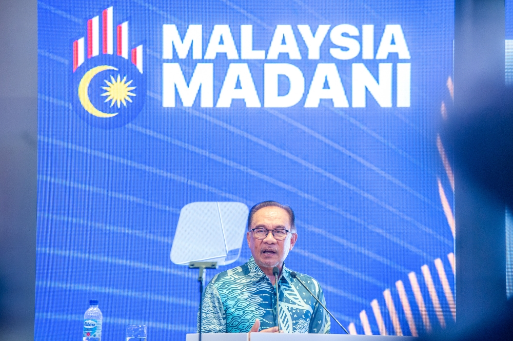 Prime Minister Datuk Seri Anwar Ibrahim delivers his speech at the launch of the Madani Economy: Empowering the People framework in Kuala Lumpur 27 July 2023. —Picture by Shafwan Zaidon