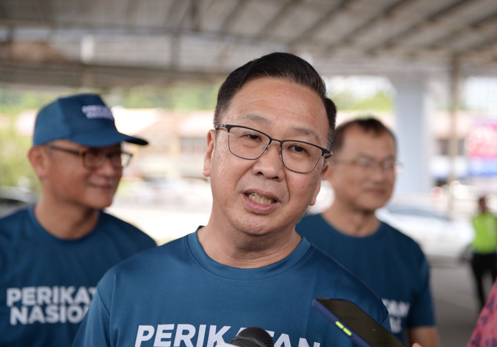 Perikatan Nasional Bayan Lepas candidate Datuk Dominic Lau Hoe Chai speaks to reporters during a walkabout at Bayan Lepas, Penang July 30, 2023. — Picture by KE Ooi