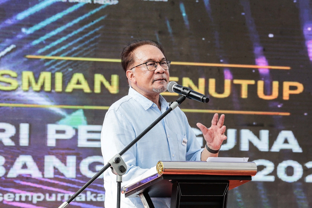 Prime Minister Datuk Seri Anwar Ibrahim delivers his speech during the closing of 2023 National Consumer Day at Piazza Pavillion Bukit Jalil July 30, 2023. — Picture by Sayuti Zainudin