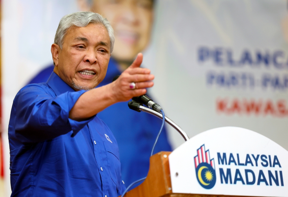 Responding to continued allegations of vote buying against him, the Umno president also said the political rivals accusing him of this had behaved similarly when they were in government. — Bernama pic 