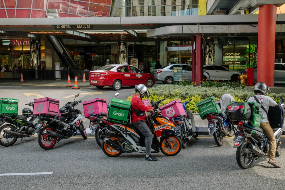 The Ministry of Transport said that the prime minister had asked for the meeting after meeting p-hailing riders on July 22 to understand the challenges they face. — Picture by Firdaus Latif