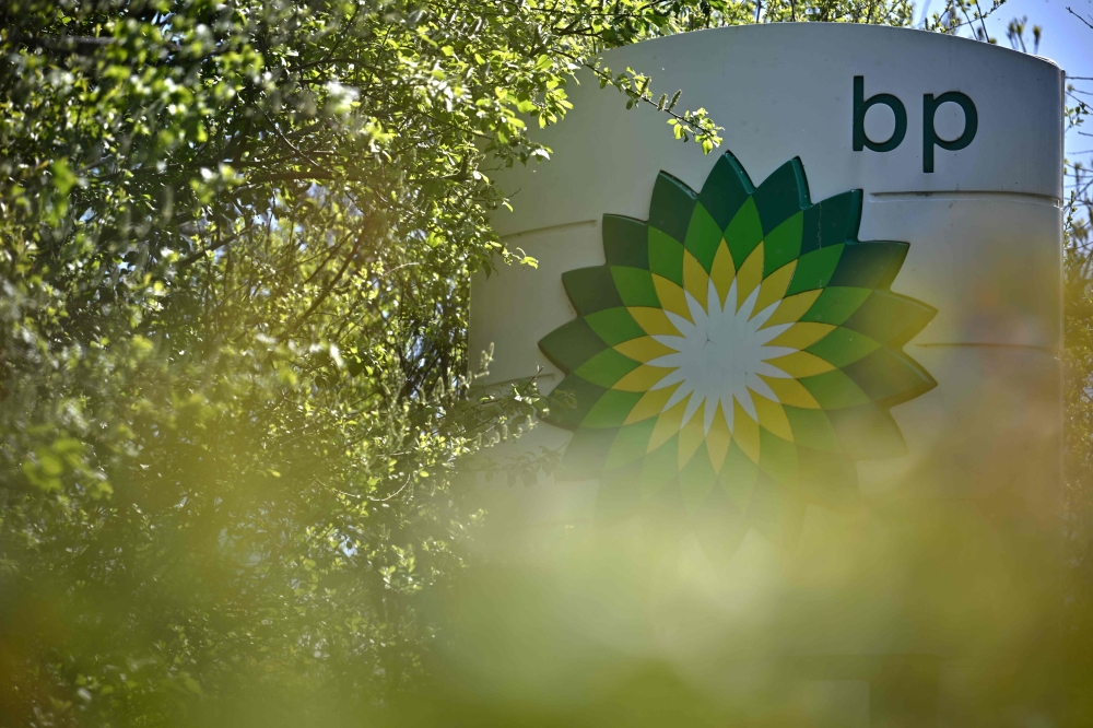 Profit after tax plunged to US$1.8 billion in the three months to the end of June compared with US$9.3 billion in the second quarter last year, BP said in a statement, mirroring hefty falls across the sector. — AFP pic