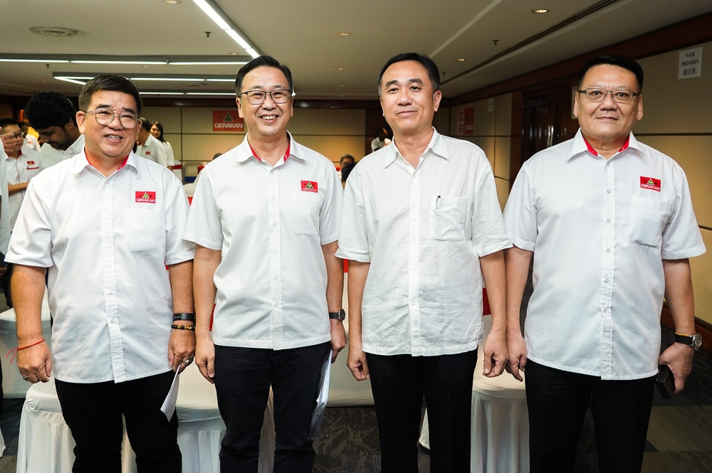 Gerakan president Datuk Dominic Lau (2nd left) together with Datuk Micheal Gan Peng Lam (right), Liang Teck Meng (2nd right) and Datuk Loi Hoi Keong (left) after submitting a nomination form for the party’s candidate selection in Kuala Lumpur, July 8, 2023. — Picture by Miera Zulyana