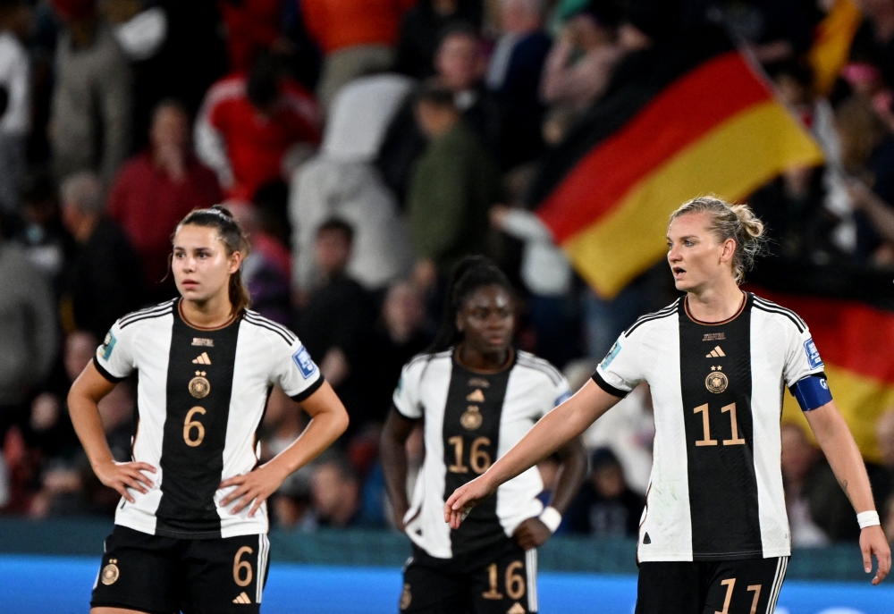 Germany’s Lena Oberdorf, Nicole Anyomi and Alexandra Popp looks dejected after Germany are knocked out of the World Cup at Brisbane Football Stadium, Brisbane, Australia, August 3, 2023. — Reuters pic  