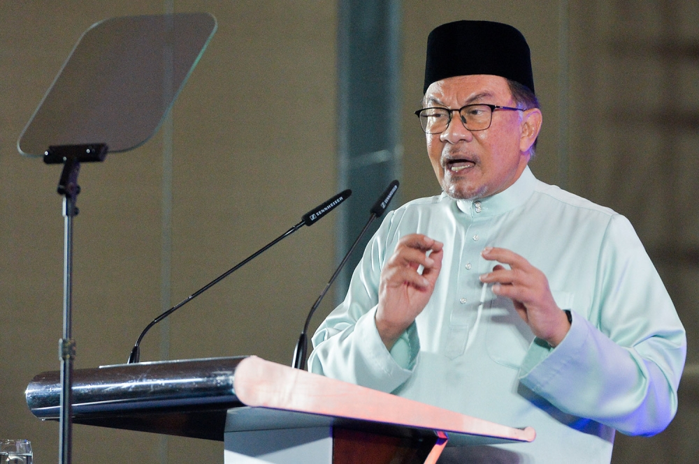 Prime Minister Datuk Seri Anwar Ibrahim speaks during Malaysian Commercialisation Year Summit 2023 in Bangsar August 4, 2023. ― Picture by Miera Zulyana