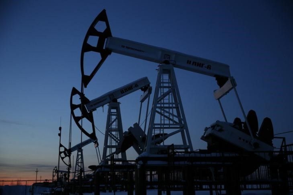 Oil prices rose today with extended voluntary output cuts from Saudi Arabia and Russia, offsetting earlier losses due to the downgrade of the US’ long-term credit rating. — Reuters pic