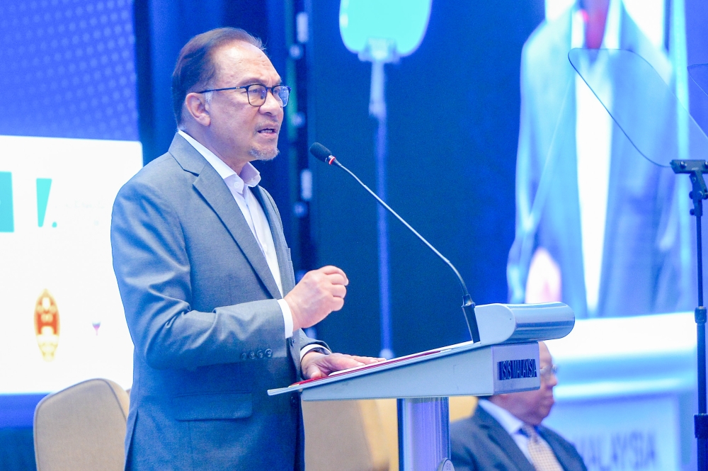 Prime Minister Datuk Seri Anwar Ibrahim delivering his keynote address at the 36th Asia-Pacific Roundtable in Kuala Lumpur August 10, 2023. — Picture by Shafwan Zaidon