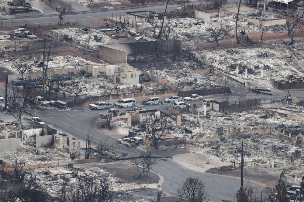 The death toll from a wildfire that has turned the resort town of Lahaina on Hawaii’s Maui island into smouldering ruins rose to 53 yesterday. — Reuters pic