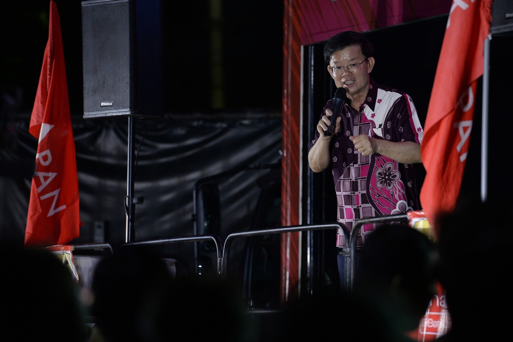 Penang DAP chairman Chow Kon Yeow giving his speech at Taman Lip Sin in Penang, August 9, 2023. — Picture by KE Ooi
