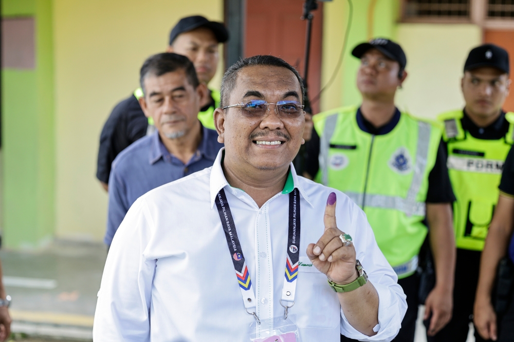 Menteri Besar Datuk Seri Muhammad Sanusi Md Nor poses for a picture after casting his vote at SK Bandar Baru Beris Jaya, Sik August 12, 2023. — Bernama pic