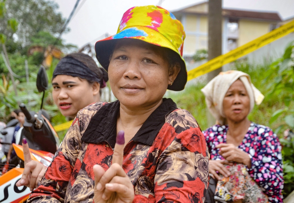 Orang Asli from the Temiar community after casting their votes in N.45 Galas at Sekolah Kebangsaan (SK) Kuala Betis, Kelantan, August 12, 2023. — Bernama pic 