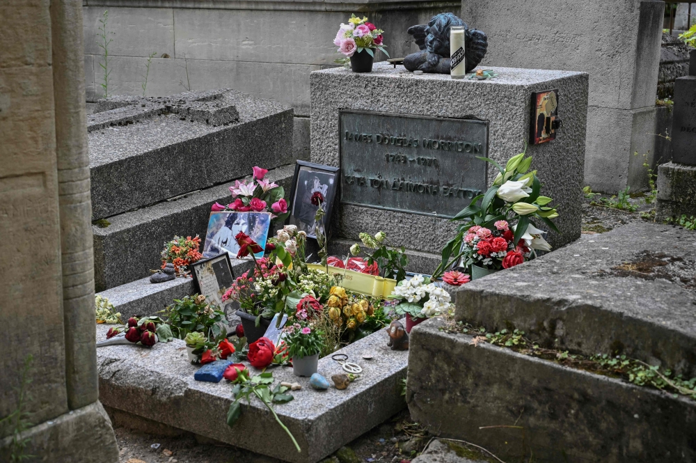 The tomb of the band The Doors’ frontman Jim Morrison is seen at the Pere Lachaise cemetery in Paris August 8, 2023. — AFP pic