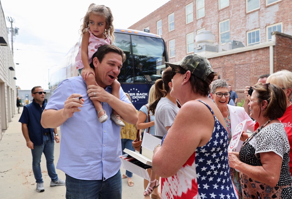 Republican US presidential candidate and Florida Governor Ron DeSantis campaigns during his ‘Never Back Down’ tour ahead of his appearance at the Iowa State Fair, in Atlantic, Iowa, US August 11, 2023. — Reuters pic