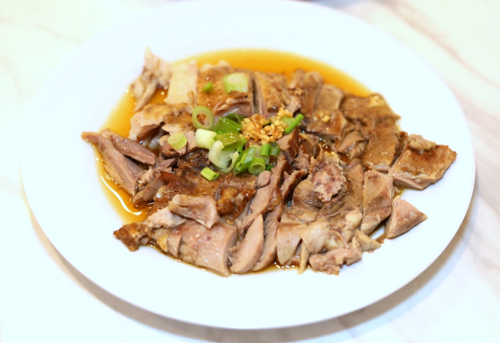 Order the Braised Pig Head to enjoy the tender meat.