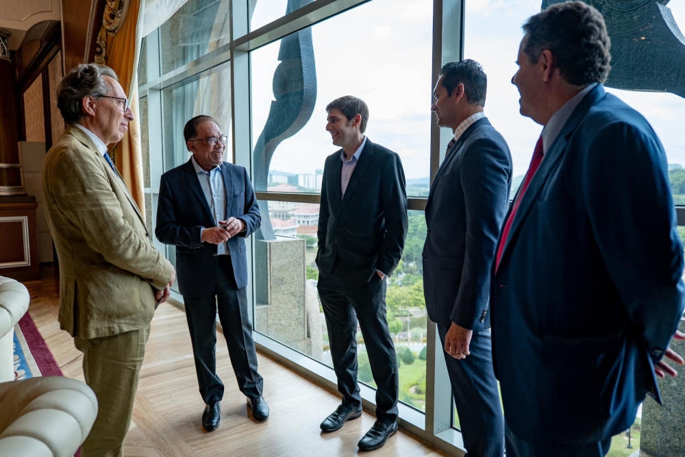 Prime Minister Datuk Seri Anwar Ibrahim meets with several leading investors in Putrajaya, among them are Facebook co-founder Eduardo Saverin and B Capital Co-Chief Executive Officer Raj Ganguly, WM Partners Founder Alejandro Weinstein and European Venture Funds Founder Peter Kadas. — Picture from Facebook/Anwar Ibrahim