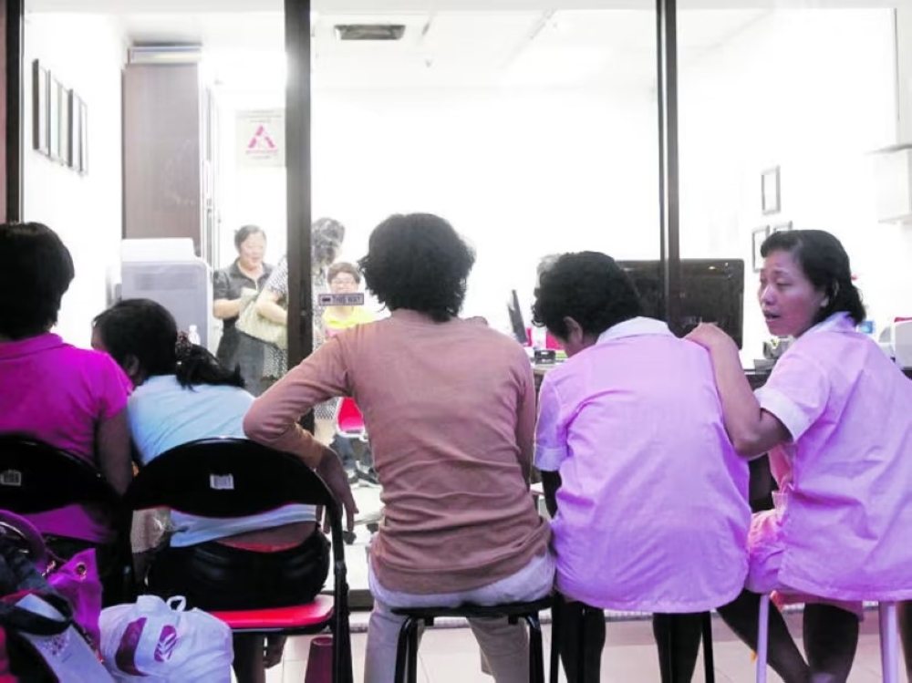 A group of domestic workers in Singapore. — TODAY pic