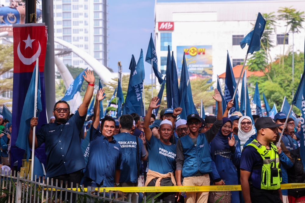 Perikatan Nasional supporters at the nomination centre for the Simpang Jeram by-election, at Dewan Jubli Intan Sultan Ibrahim in Johor Baru August 26, 2023. — Bernama pic