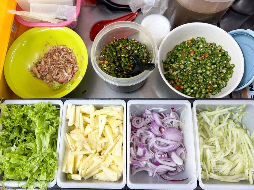 All the ingredients are prepped for the 'assam laksa'.