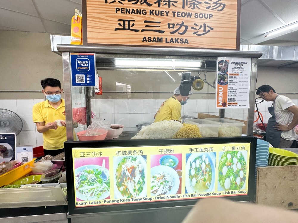 Find the stall on the left hand side of the newly opened eatery.