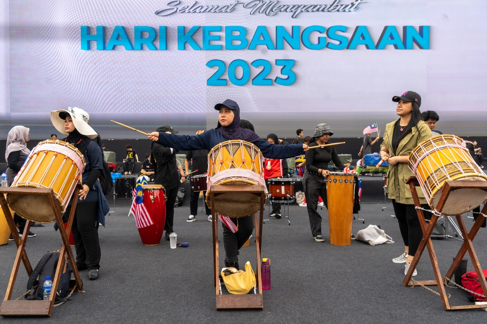 Participants practise for the 2023 National Day celebration at Dataran Putrajaya, 26 August 2023. — Picture by Shafwan Zaidon