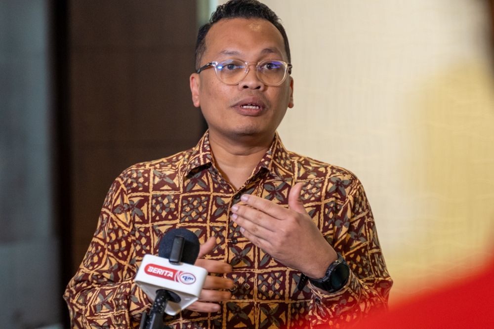 Natural Resources, Environment and Climate Change Minister Nik Nazmi Nik Ahmad said said a robust and flexible grid is critical as the intended ramping up of RE will be very much solar-based. — Picture By Raymond Manuel